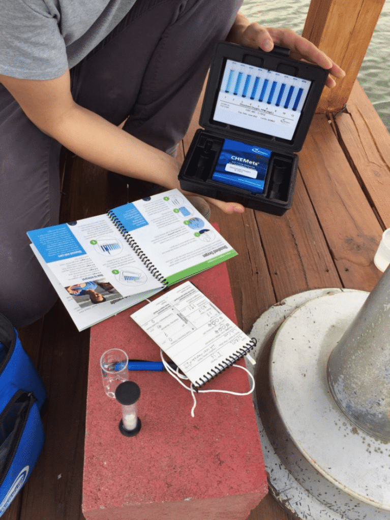 Tester in Florida showing the contents of a dissolved oxygen kit, used for water testing