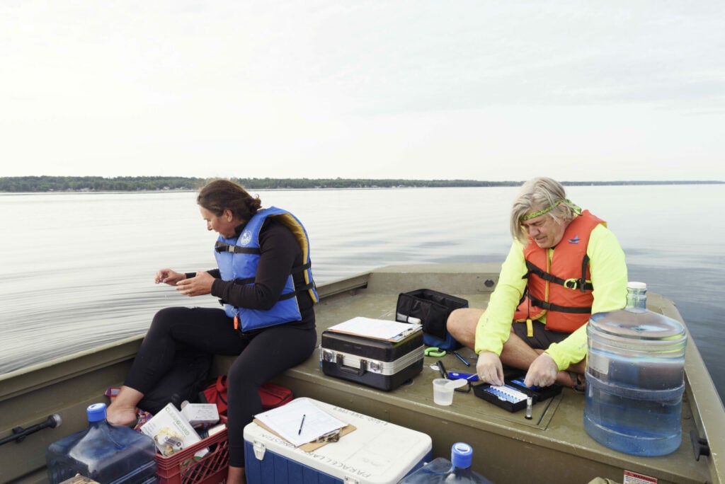 Researchers taking samples and conducting tests on the St. Lawrence River